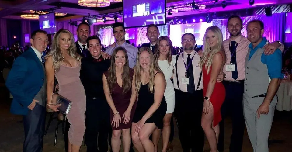 The gym leadership team together at an industry awards night